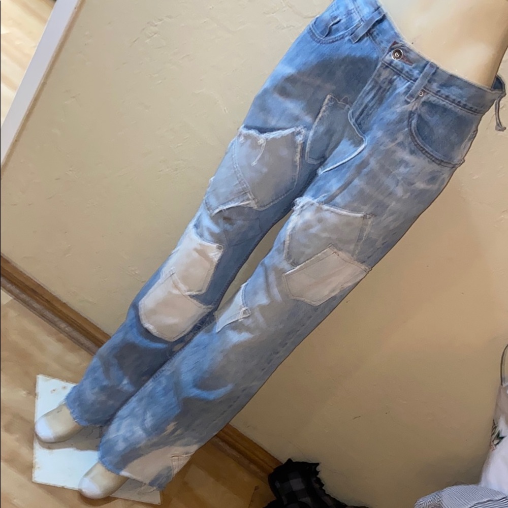 Distressed Light Blue Denim Jeans
